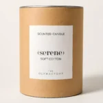 Αρωματικό κερί Soft Cotton The Olphactory σε μαρμάρινη επιφάνεια δίπλα στη συσκευασία του