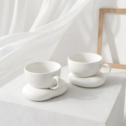 Σετ κούπες New Bone China με πορσελάνινα πιατάκια σε σχήμα βότσαλου