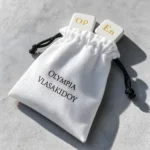 Λεπτομέρεια μαγνητών Open Mind με υφασμάτινο πουγκί byOlympia