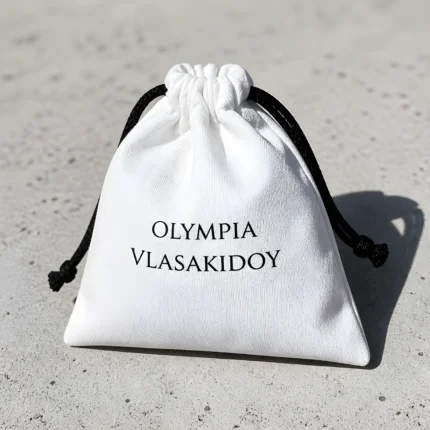 Χειροποίητο υφασμάτινο πουγκί byOlympia με εκτύπωση Olympia Vlasakidoy για τους μαγνήτες Shine Bright